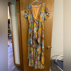 Beautiful yellow floral high-low romper dress